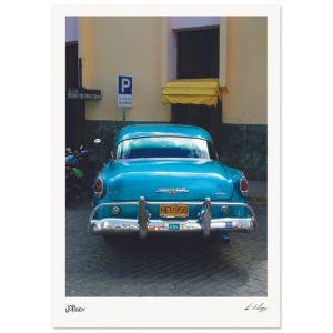 Blue classic Dodge on the streets of Guantanamo Cuba